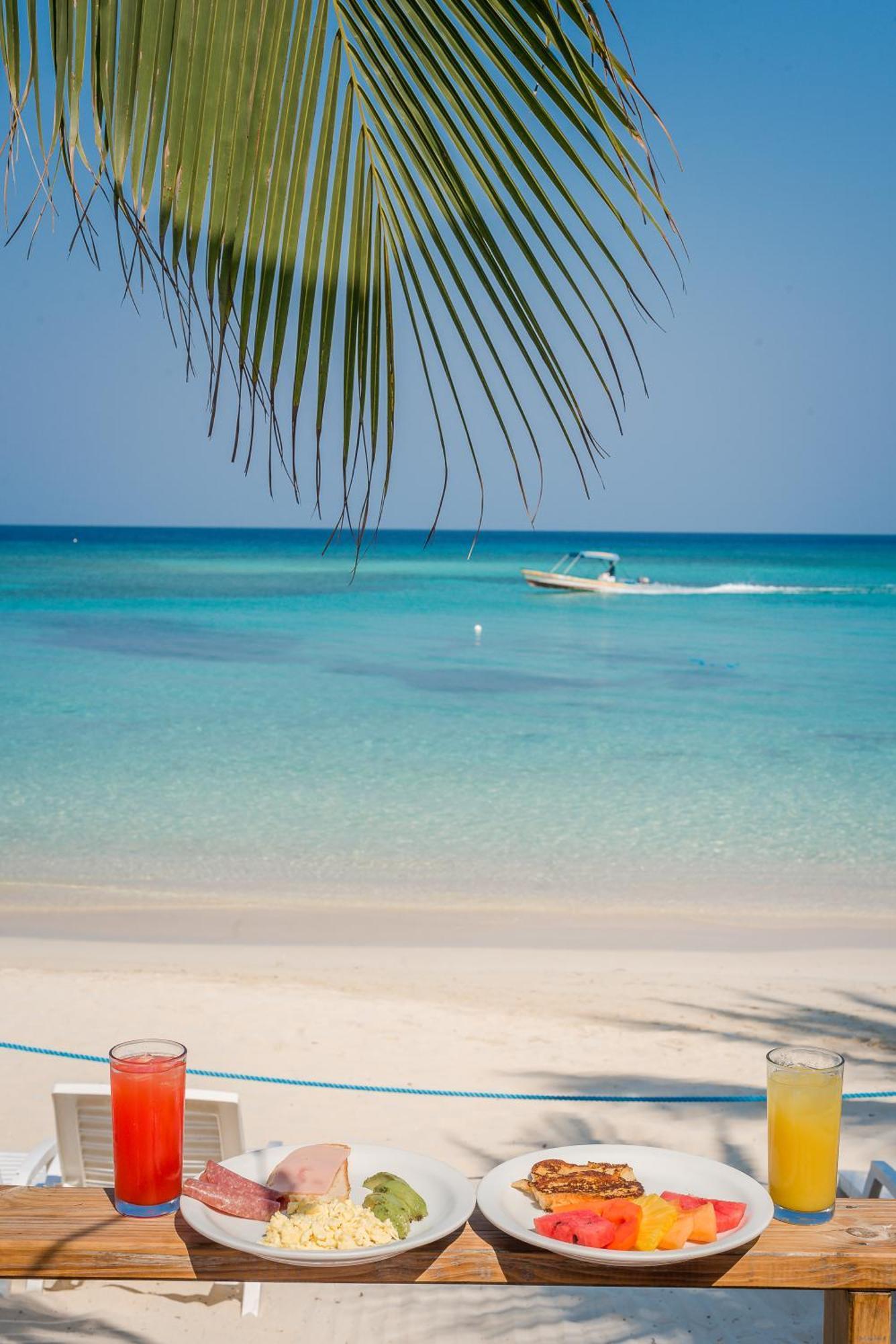 Paradise Beach Hotel & Resort West Bay Exterior photo