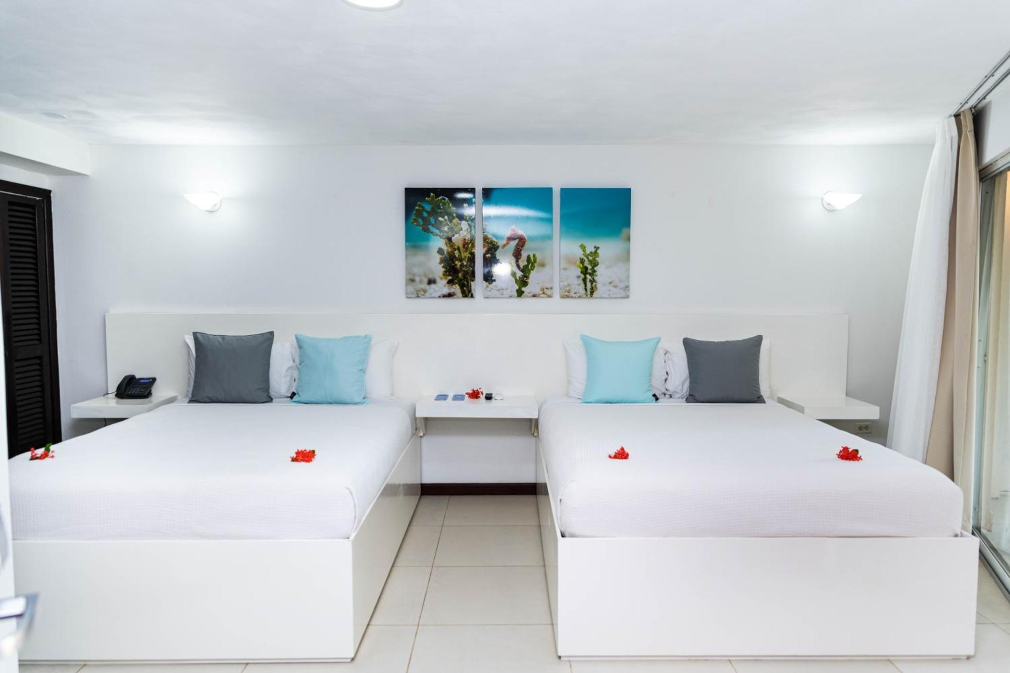 Paradise Beach Hotel & Resort West Bay Room photo