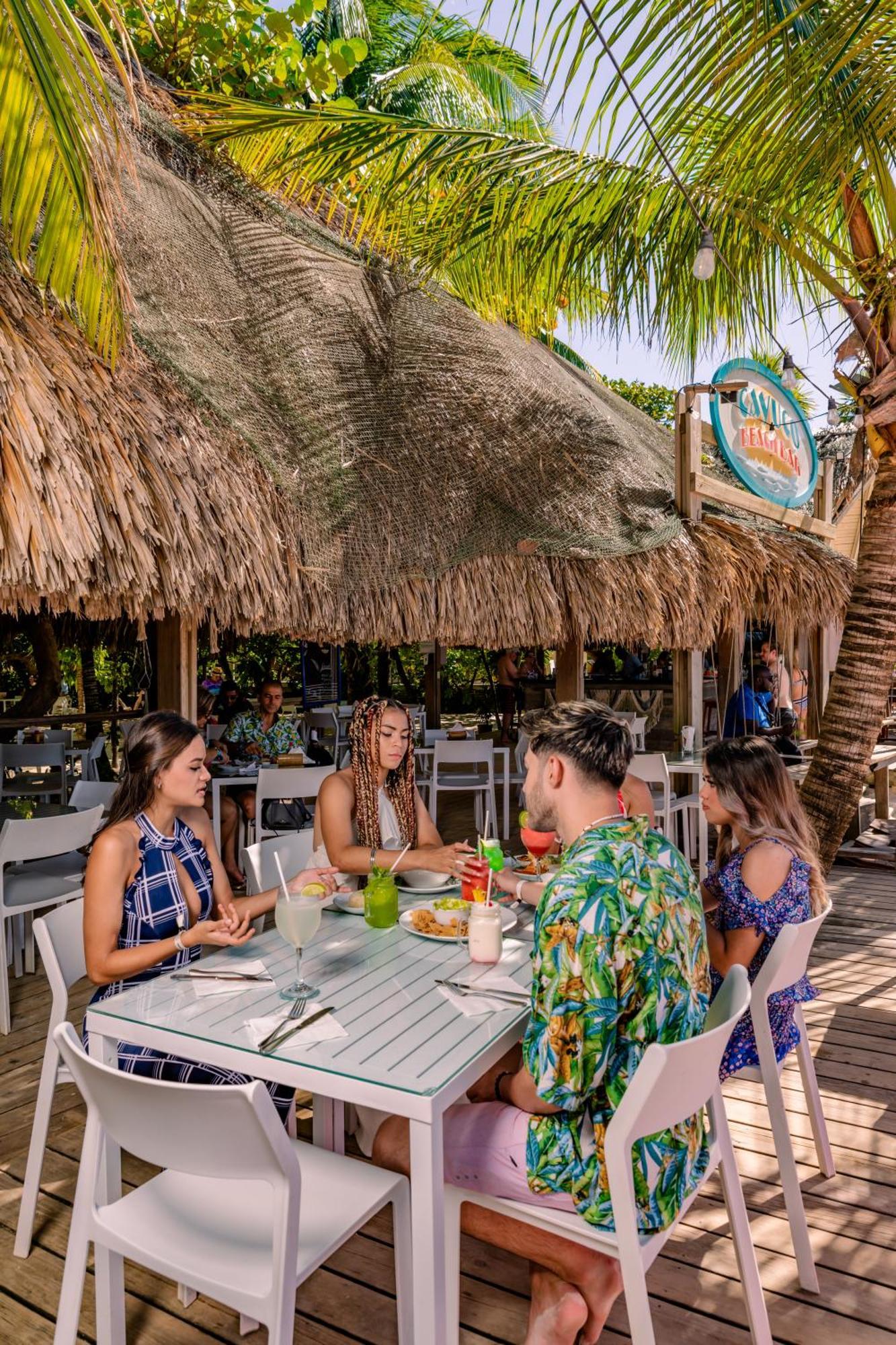 Paradise Beach Hotel & Resort West Bay Exterior photo